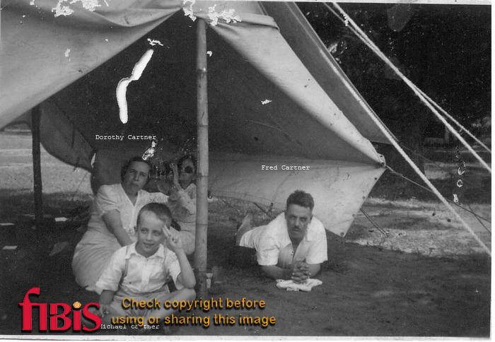 Dorothy, Fred and Michael Cartner in a tent