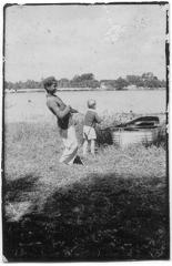 Children pulling a boat