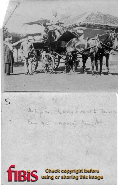 Man and woman beside a horse and carriage