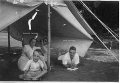 Dorothy, Fred and Michael Cartner in a tent
