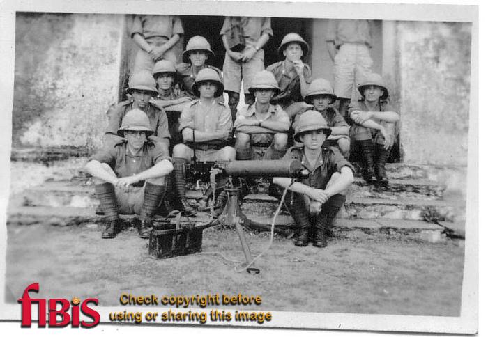 Soldiers with a machine gun