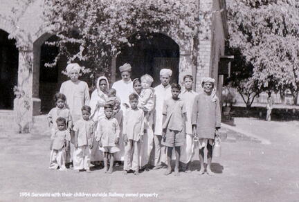 FA8 1954 Servants outside Railway owned property 